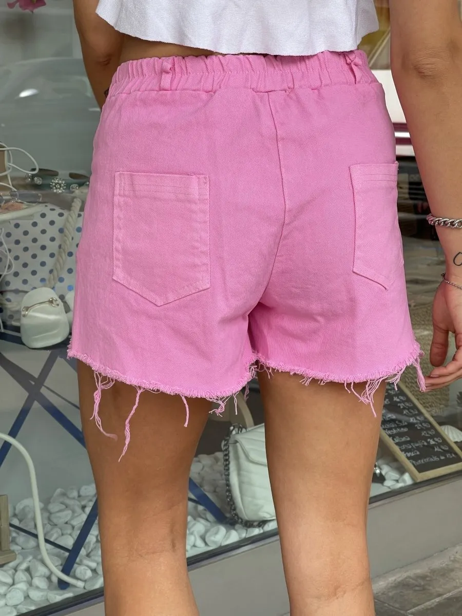 Fuchsia studded pyramid ripped shorts